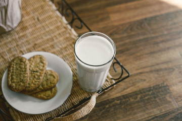 Cookie and milk on the breakfast tray. Breakfast biscuits. Healthy