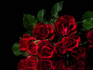 Bouquet of red roses on a black background