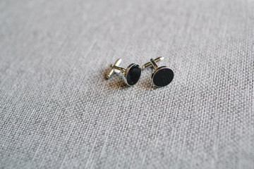 beautiful and glamorous golden cufflinks with black stones