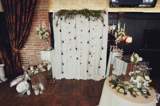beautifully decorated fotozone for a wedding celebration in a re