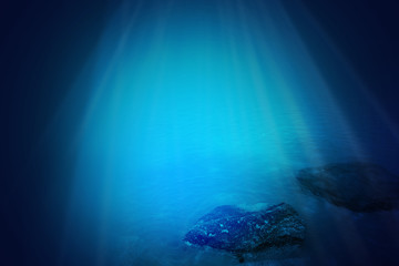 Deep blue sea background with sunlight shining 
