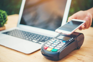 Woman using mobile payment