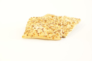 
Dietary cookies with sesame seeds, flax and sunflower isolated on white background