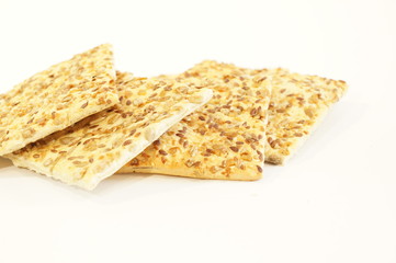 
Dietary cookies with sesame seeds, flax and sunflower isolated on white background