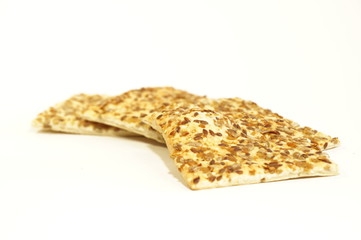 Dietary cookies with sesame seeds, flax and sunflower isolated on white background