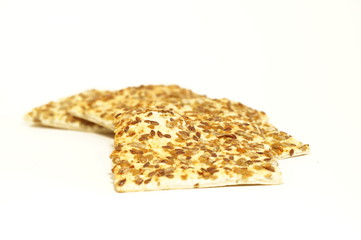 Dietary cookies with sesame seeds, flax and sunflower isolated on white background