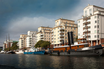 Obraz premium Waterways, boats and beautiful old buildings in Stockholm, Sweden