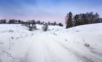 The road on the snow-covered Russian village, Tula region