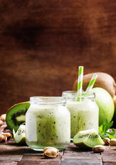 Healthy Smoothies from kiwi, banana, green apple and pistachios,