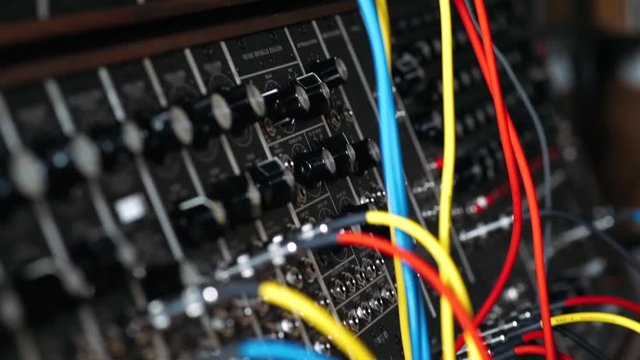 Recording studio, the wires connected to the console, close-up. 