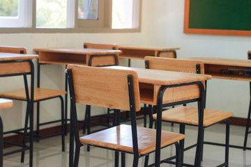 School classroom with desks wood, chalkboard, whiteboard in high