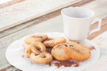 Fresh cookies on rustic wooden table.