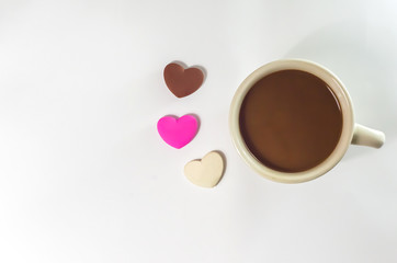 coffee cup and chocolate heart-shaped