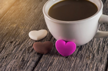 coffee cup and chocolate heart-shaped