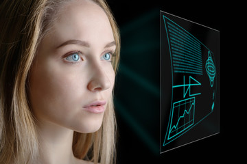 Woman looking at virtual graphics interface.