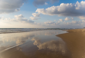 clouds are reflected in the sea