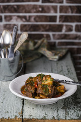 Meat ribs with tomato sauce