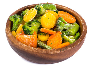 Frozen vegetables mix on a white background