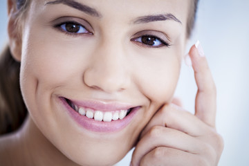 Fototapeta premium Woman Applying Face Cream