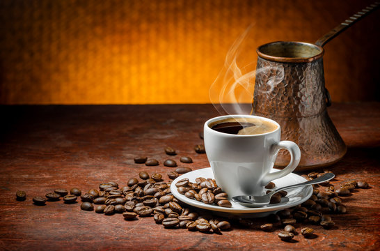 Coffee cup and saucer on a wooden table