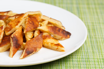 Home made Kaiserschmarrn on white plate, closeup, low focus