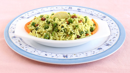 Indian vegetarian food lemon rice, a popular and traditional south indian dish in a plate.