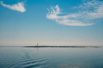 Fototapeta na wymiar Rukkirahu lighthouse at small uninhabited island, Estonia