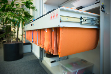 Paperwork in a filing cabinet