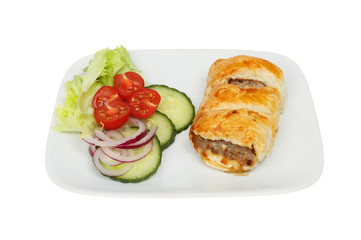 Sausage roll with salad