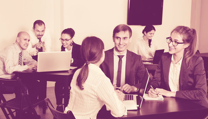 Coworkers working effectively on business project together