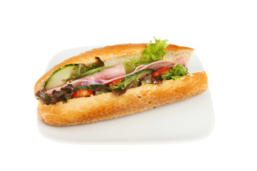 Ham salad roll on a plate