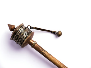 Tibetan Prayer Wheel isolated on white background,