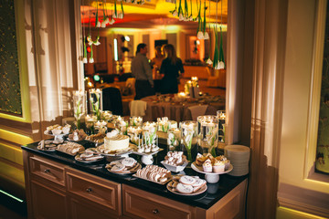 The buffet table with  biscuits for birthday party