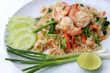 Delicious Shrimp fried rice. Unique style in the white dish on white background,  Thai food.