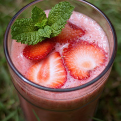 strawberry smoothie with mint leaves