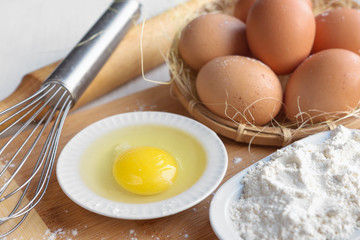 Eggs and flour ingredients like baking, culinary background