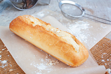 Fresh bread on a table. Selective focus
