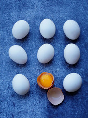 composition of fresh farm white eggs on dark background