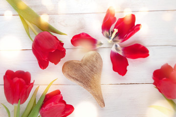 Background with tulips around a heart