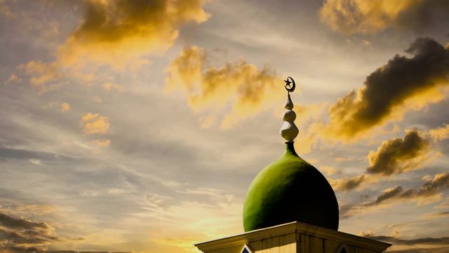 the top of a mosque minaret with a cupola dome