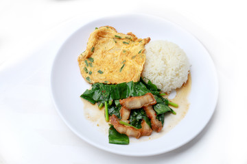 Stir fried kale with crispy pork and Thai Omelette with rice in white dish iIsolated on white background, Thai Food