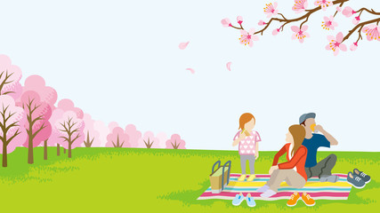 Family picnic in spring nature