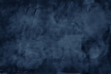 The texture of crumpled paper blue