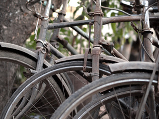ABSTRACT SHOT OF OLD RUSTY BICYCLE PARTS