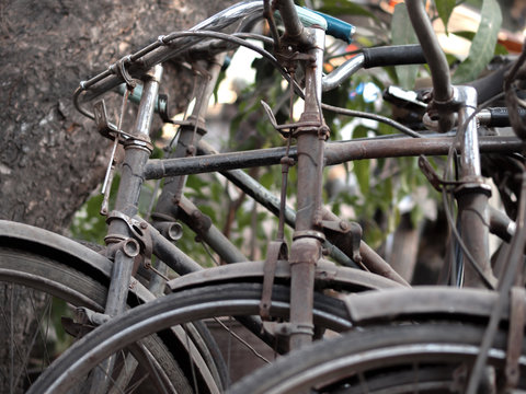 ABSTRACT SHOT OF OLD RUSTY BICYCLE PARTS
