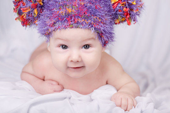 cute baby in colorful hat