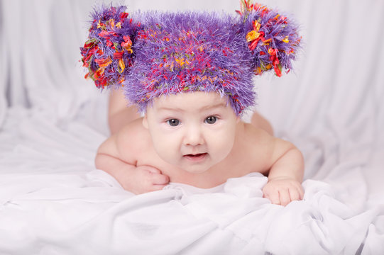 cute baby in colorful hat