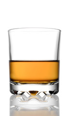 Glass of whiskey on a white background