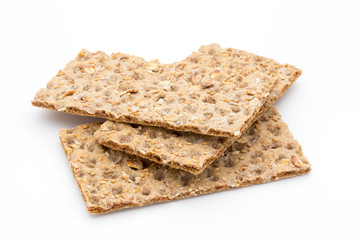 Stack of wholegrain crispy bread with sunflower, chia and sesame