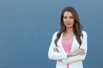 Powerful businesswoman isolated on blue 
